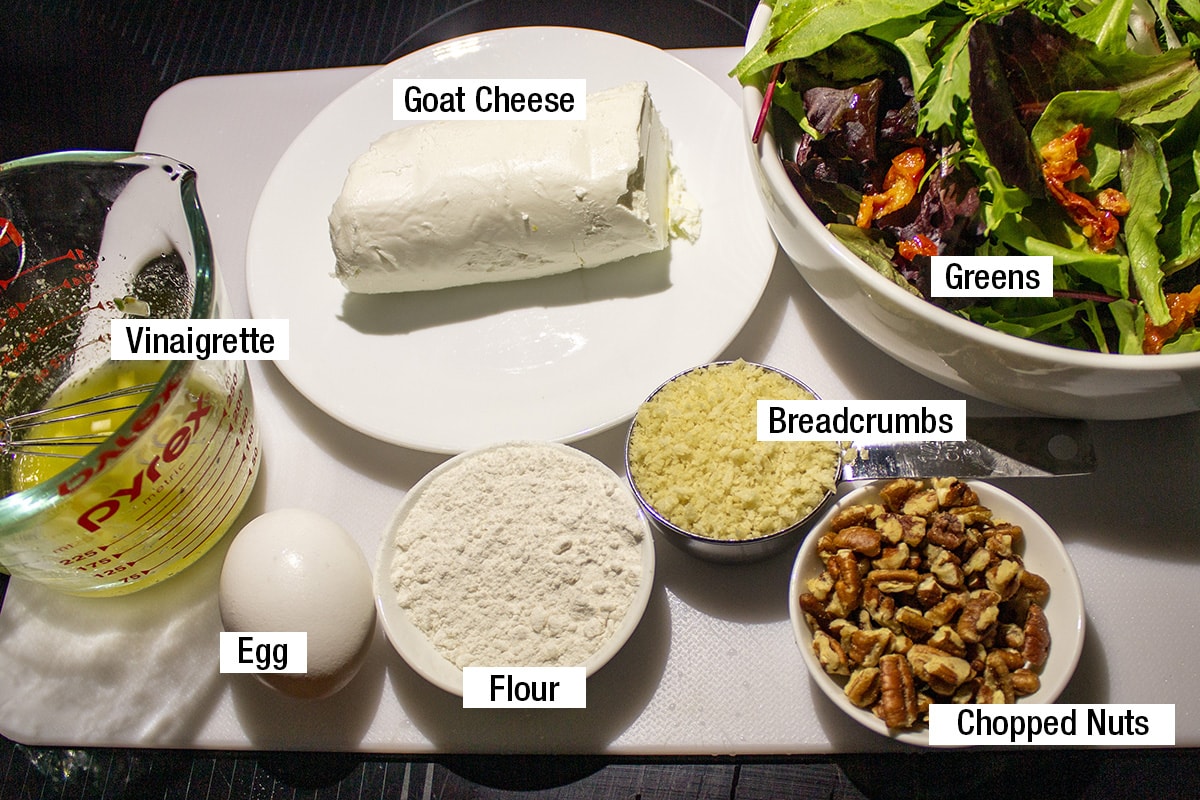 goat cheese, breadcrumbs, chopped nuts, greens, flour, egg, vinaigrette.