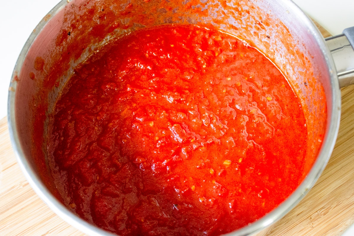 finished cooked tomato sauce in pot.