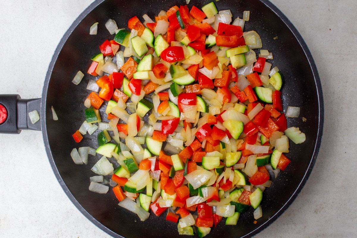sauteed vegetables in skillet.
