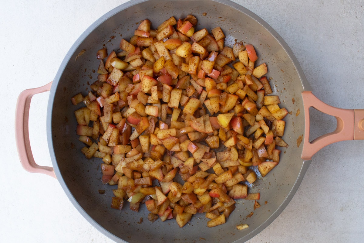 cooked apple mixture in skillet.