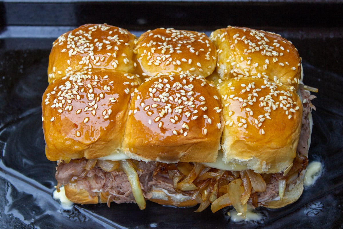 6 beef sliders on buttered pan.