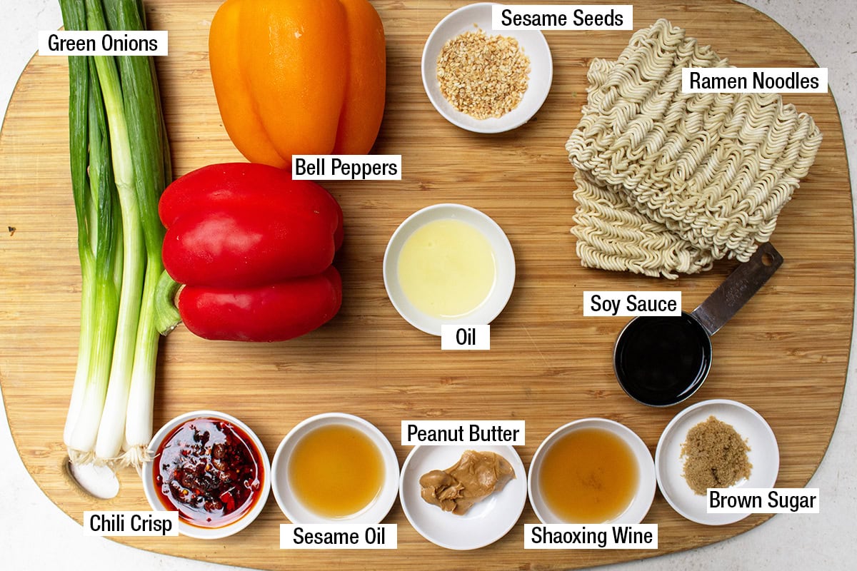 bell peppers, green onions, ramen noodles, oil, sesame seeds, chili crisp, sesame oil, peanut butter, Shaoxing wine, soy sauce, brown sugar.