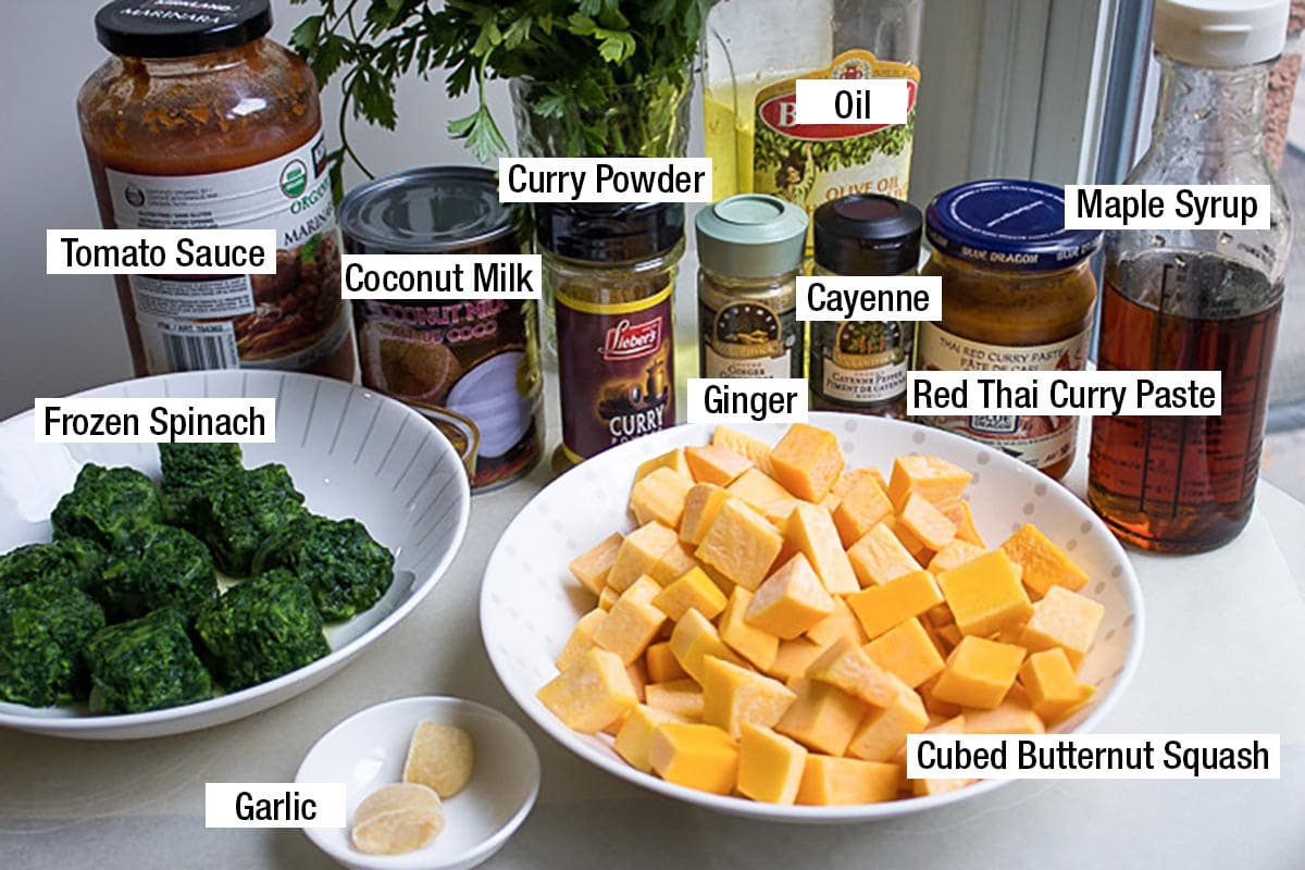 Cubed butternut squash, garlic, frozen spinach, full fat coconut milk, curry powder, ginger, cayenne, oil, red Thai curry paste, maple syrup, tomato sauce.