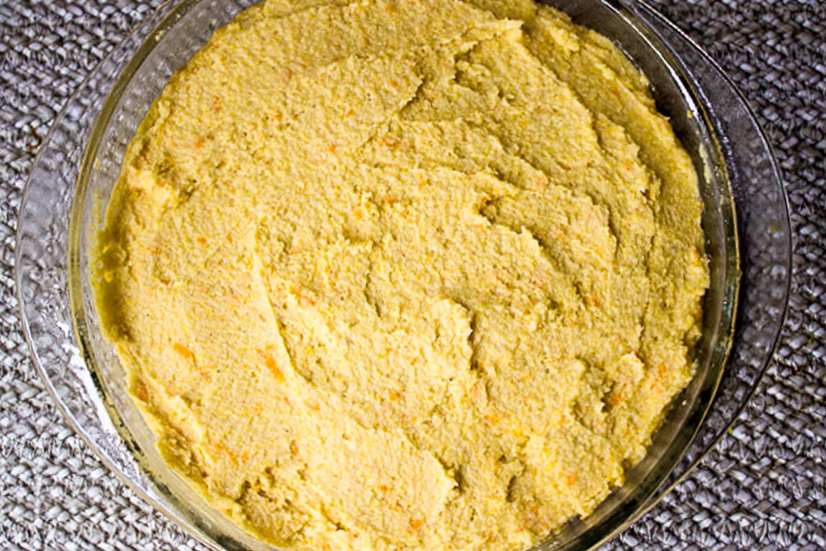 Polenta cake batter in cake pan.