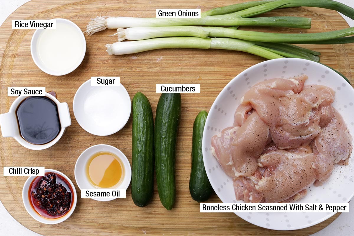 Boneless chicken seasoned with salt and pepper, cucumbers, green onions, chili crisp, sesame oil, sugar, soy sauce, rice vinegar.