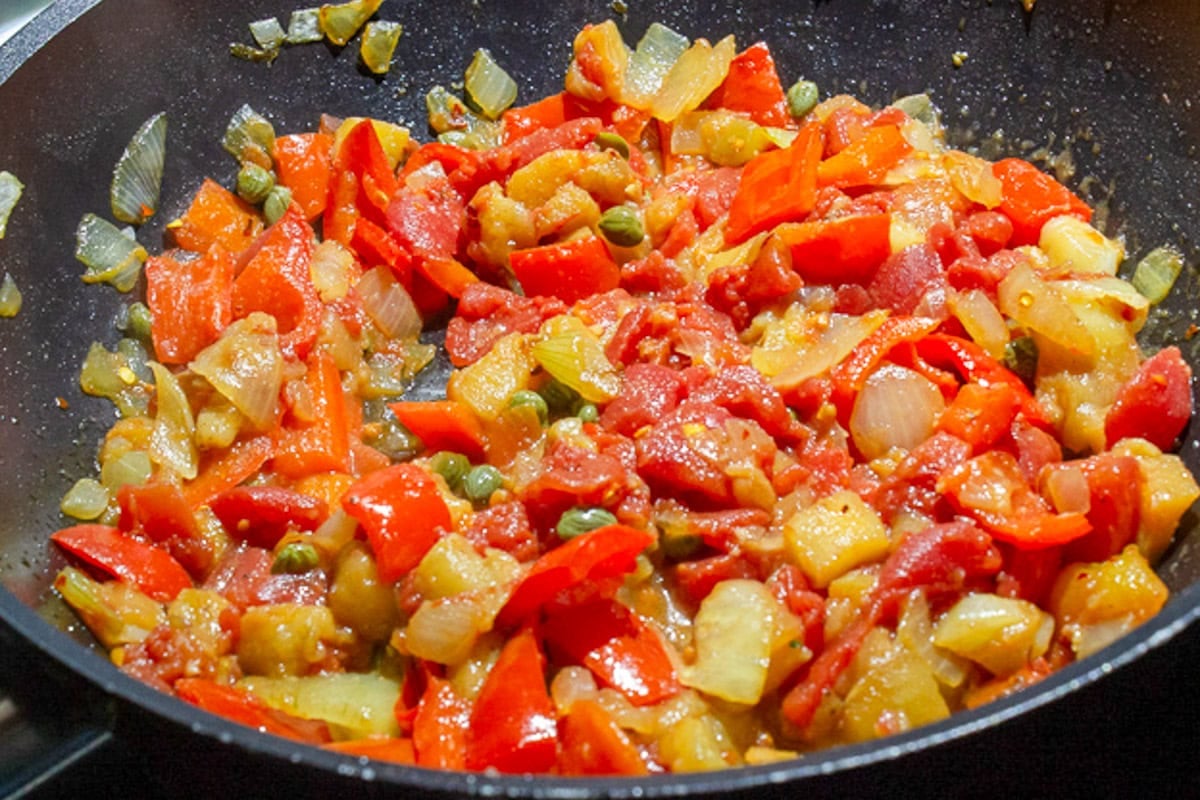 Vegetables cooked in a skillet.