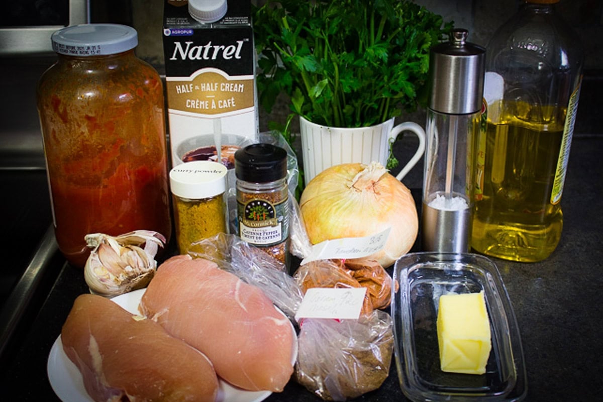 Chicken breast, Indian seasonings, butter, cream onion, garlic, cilantro, tomato sauce.