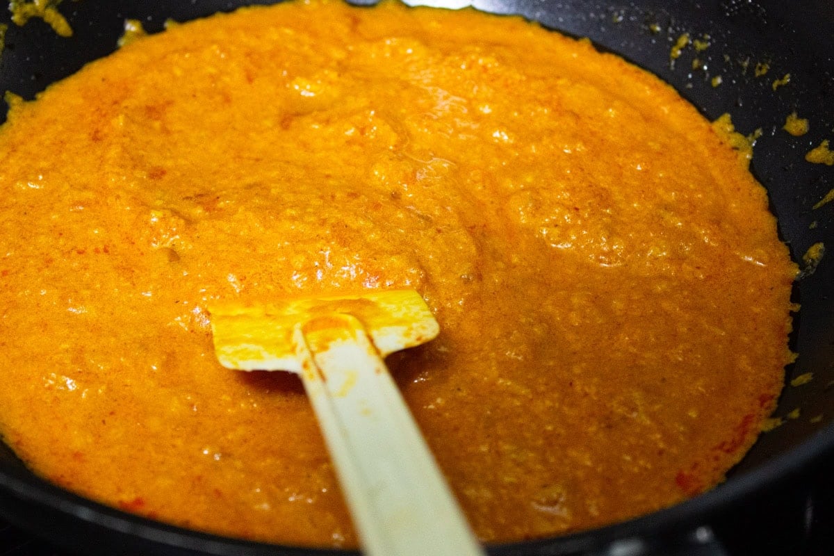 Butter chicken sauce in skillet.