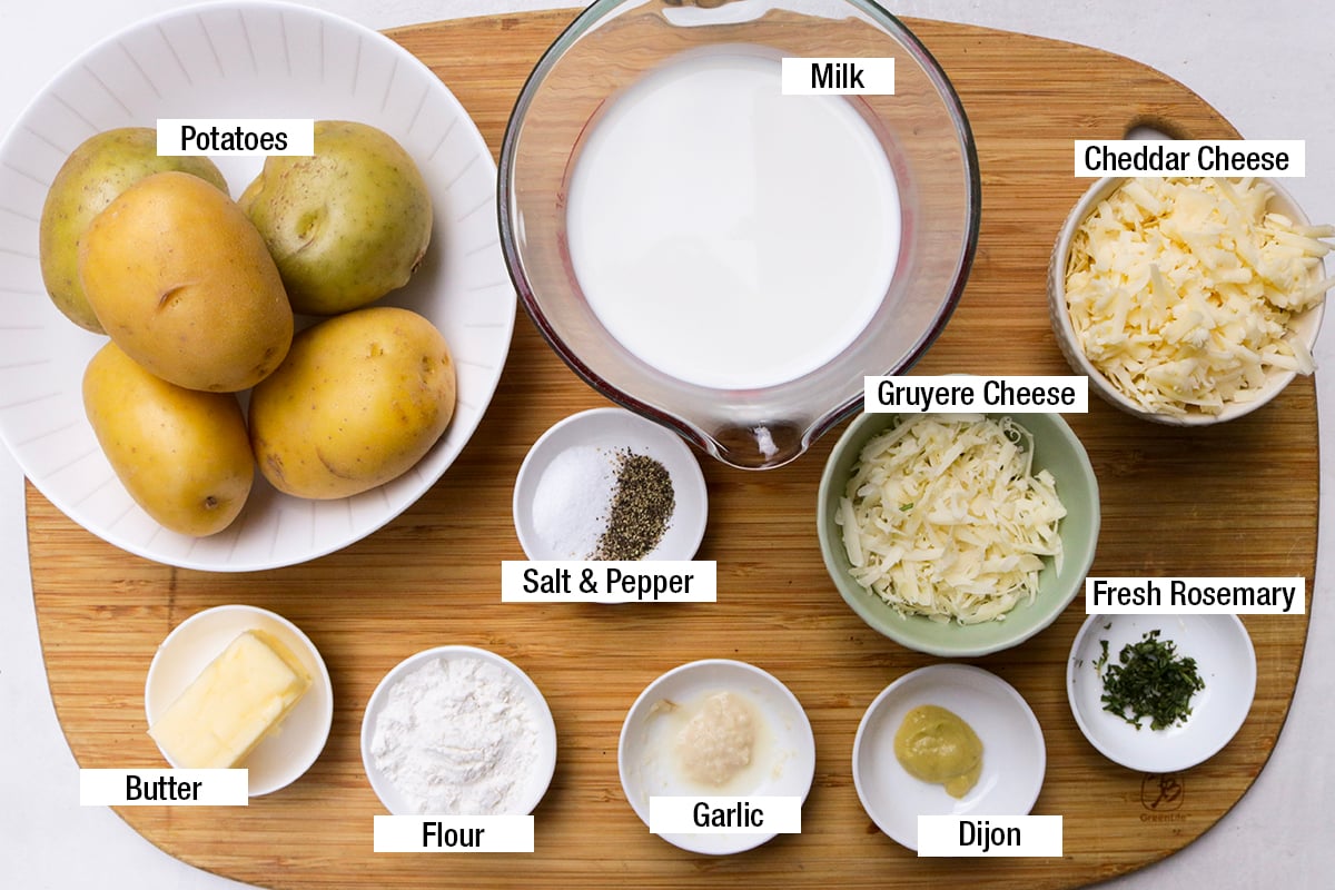 Potatoes, milk, gruyere cheese, cheddar cheese, Dijon, garlic, flour, salt & pepper, fresh rosemary, butter.