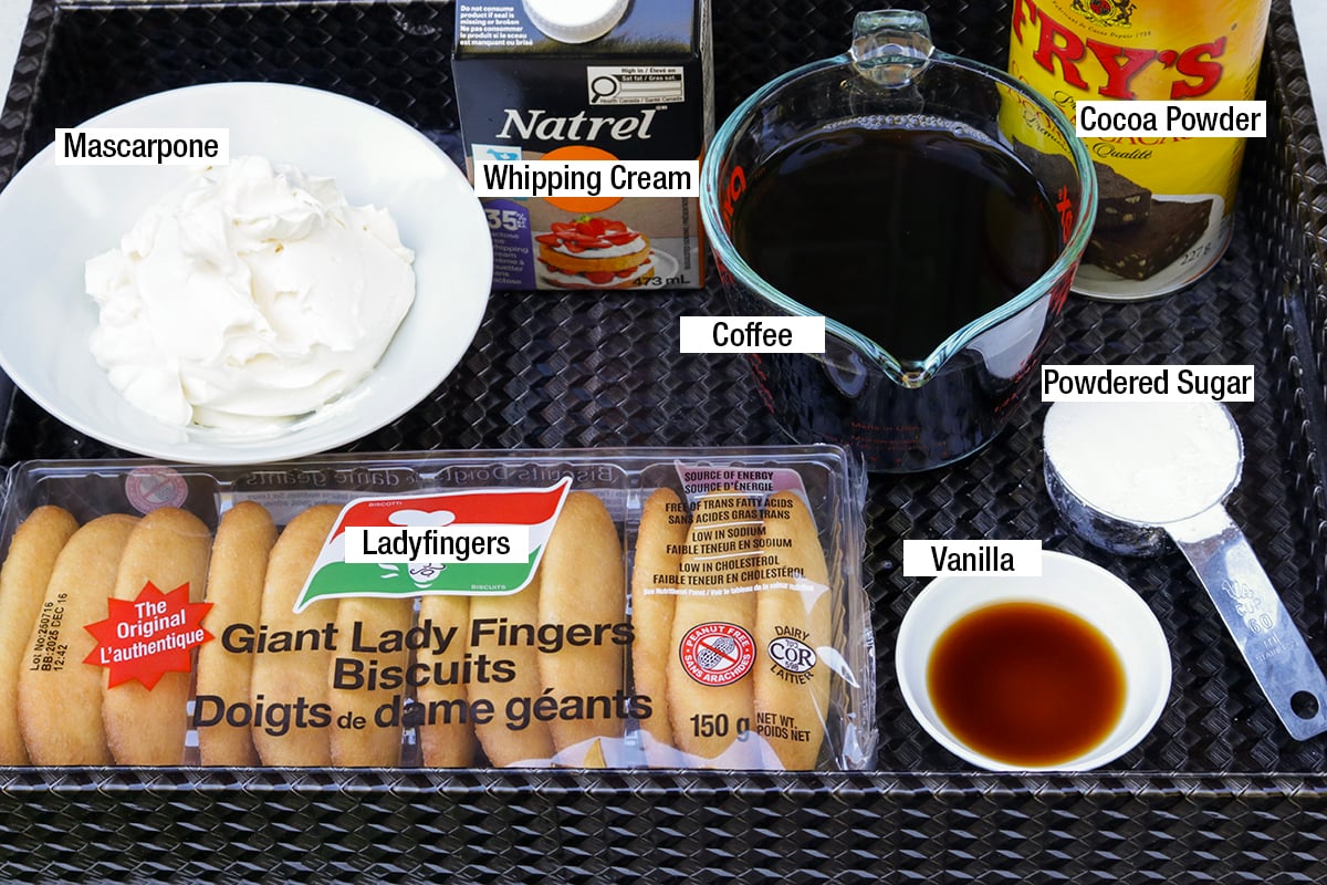 Mascarpone, whipping cream, coffee, ladyfingers, vanilla, powdered sugar, cocoa powder.