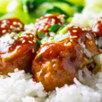 chicken meatballs with sticky sauce over white rice.