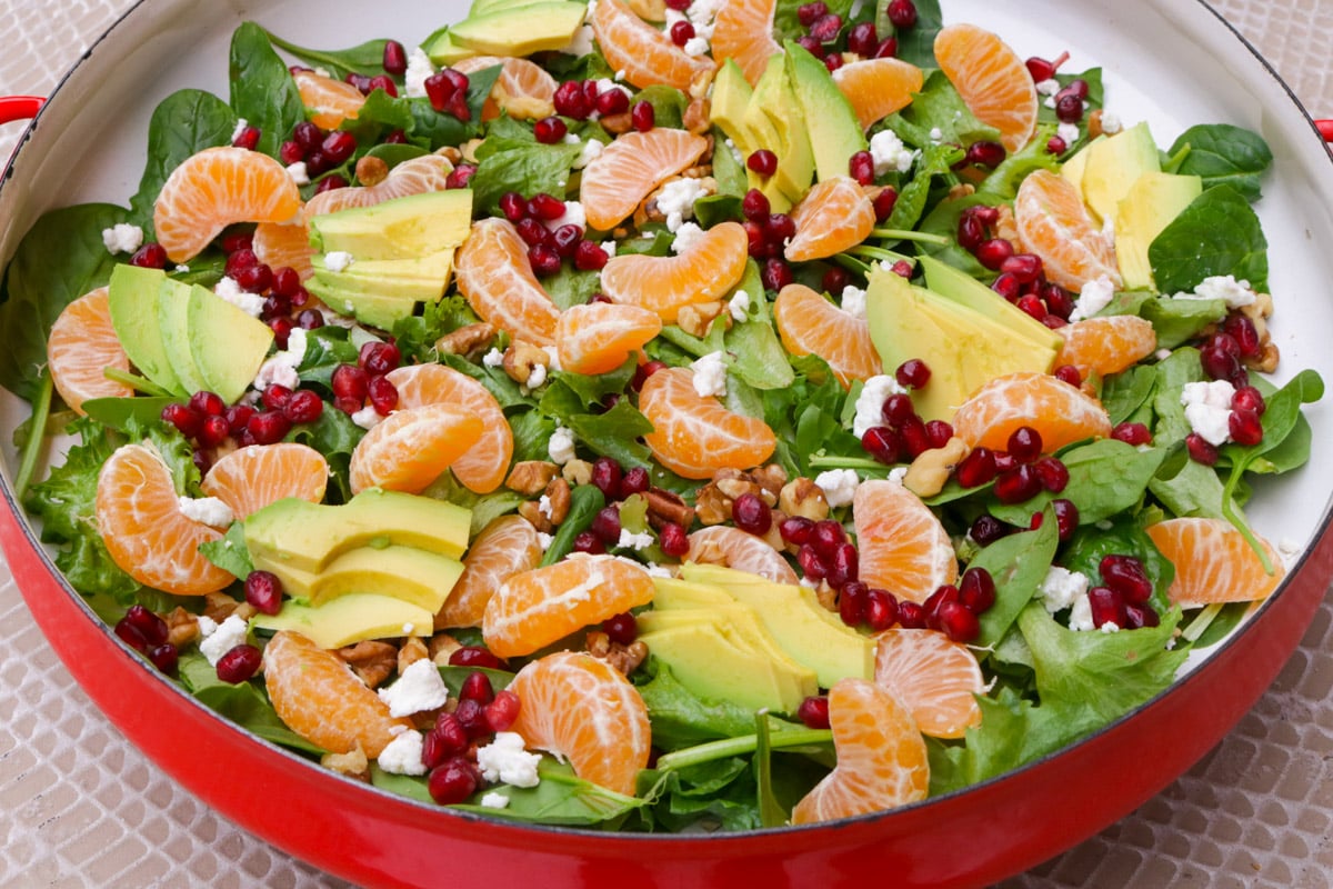 Mandarin orange salad in a shallow serving bowl on table.