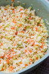 KFC cabbage in pale green mixing bowl.