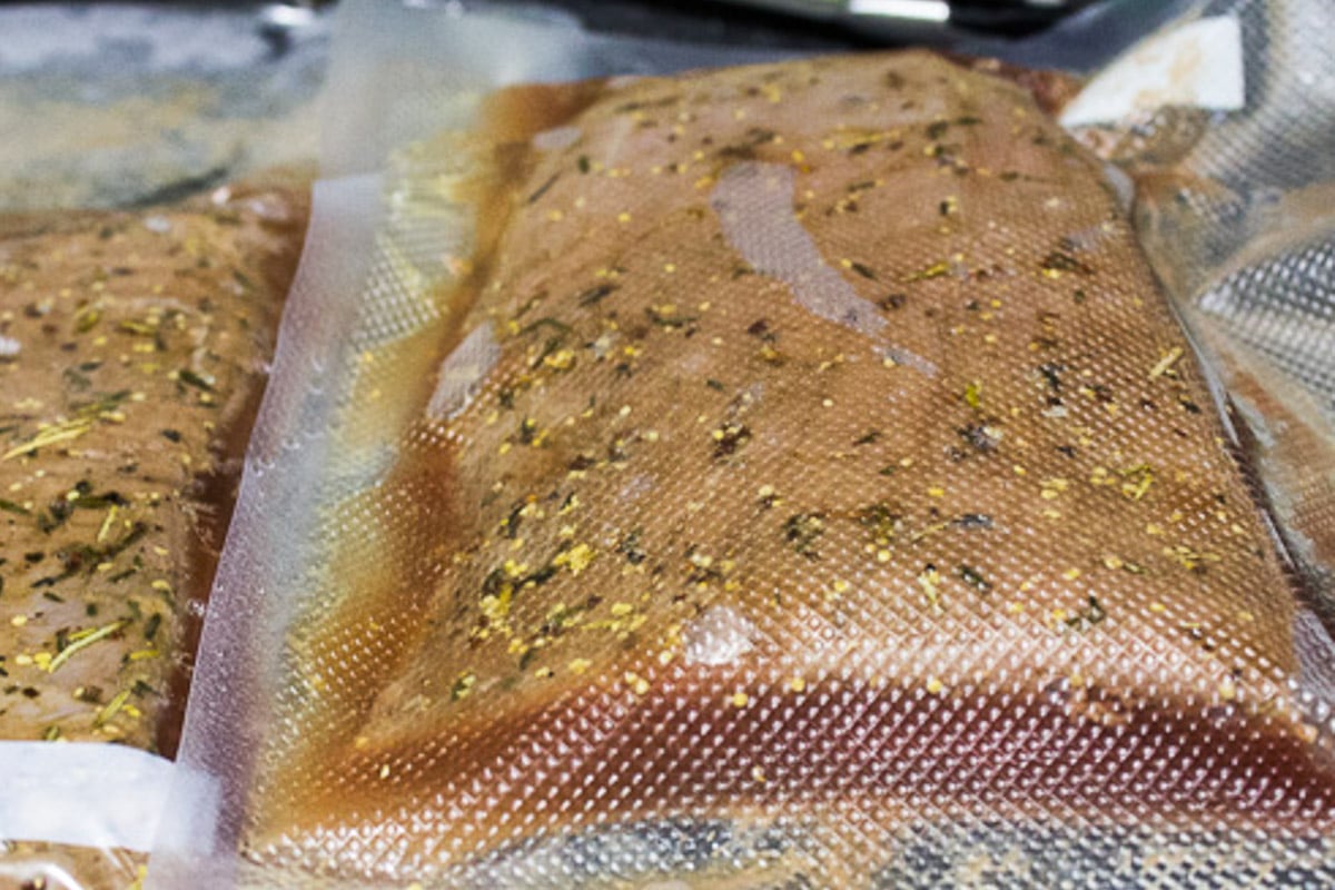 Sous vide flank steak in vacuum sealed bag.