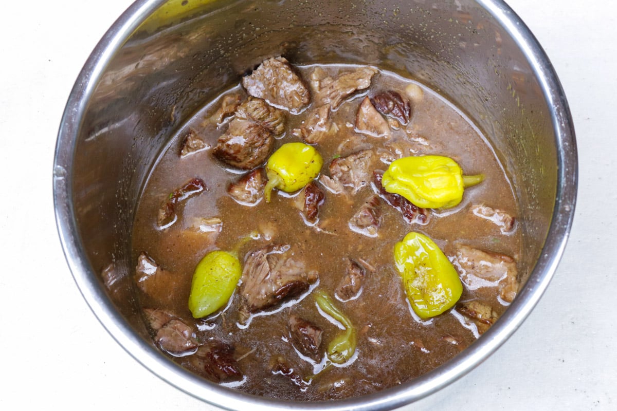 Mississippi pot roast in gravy in an Instant Pot.