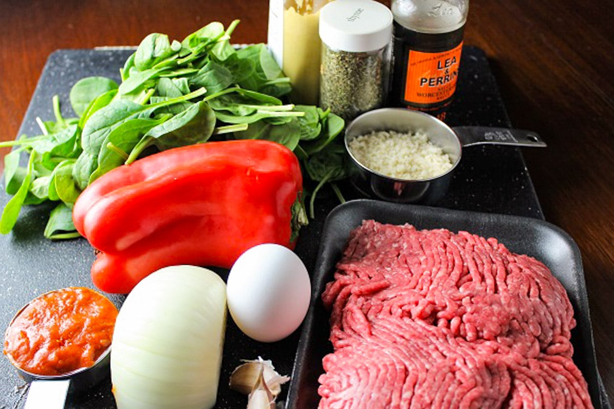 Ground beef, egg, onion, garlic, oats, tomato sauce, baby spinach, thyme, Dijon, Worcestershire sauce.
